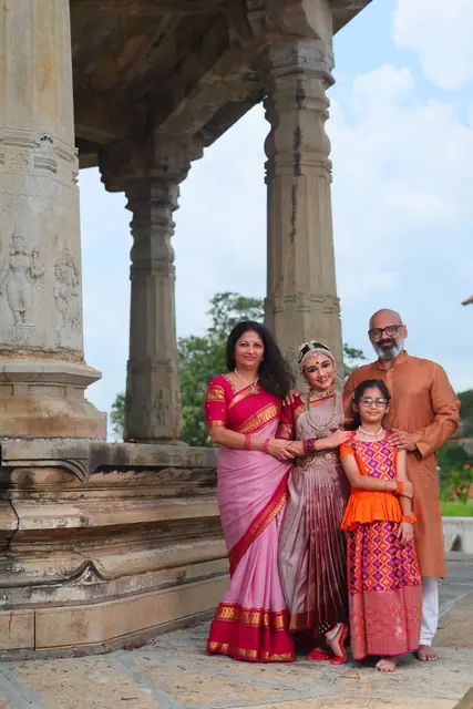 Ananya with her parents and little sister at the temple
