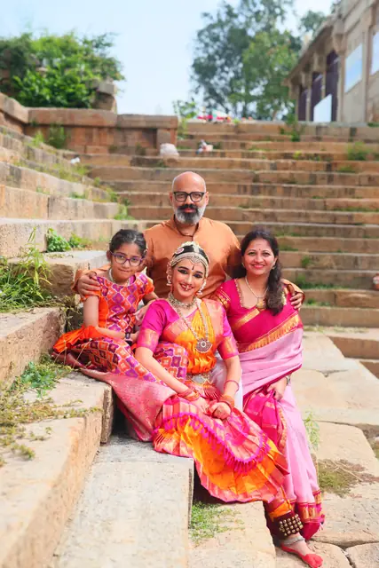 The family together on the old stone steps
