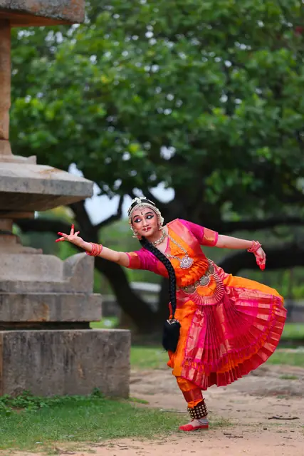 A joyful spin amid greenery and temple ruins