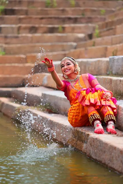 A joyful moment by the water